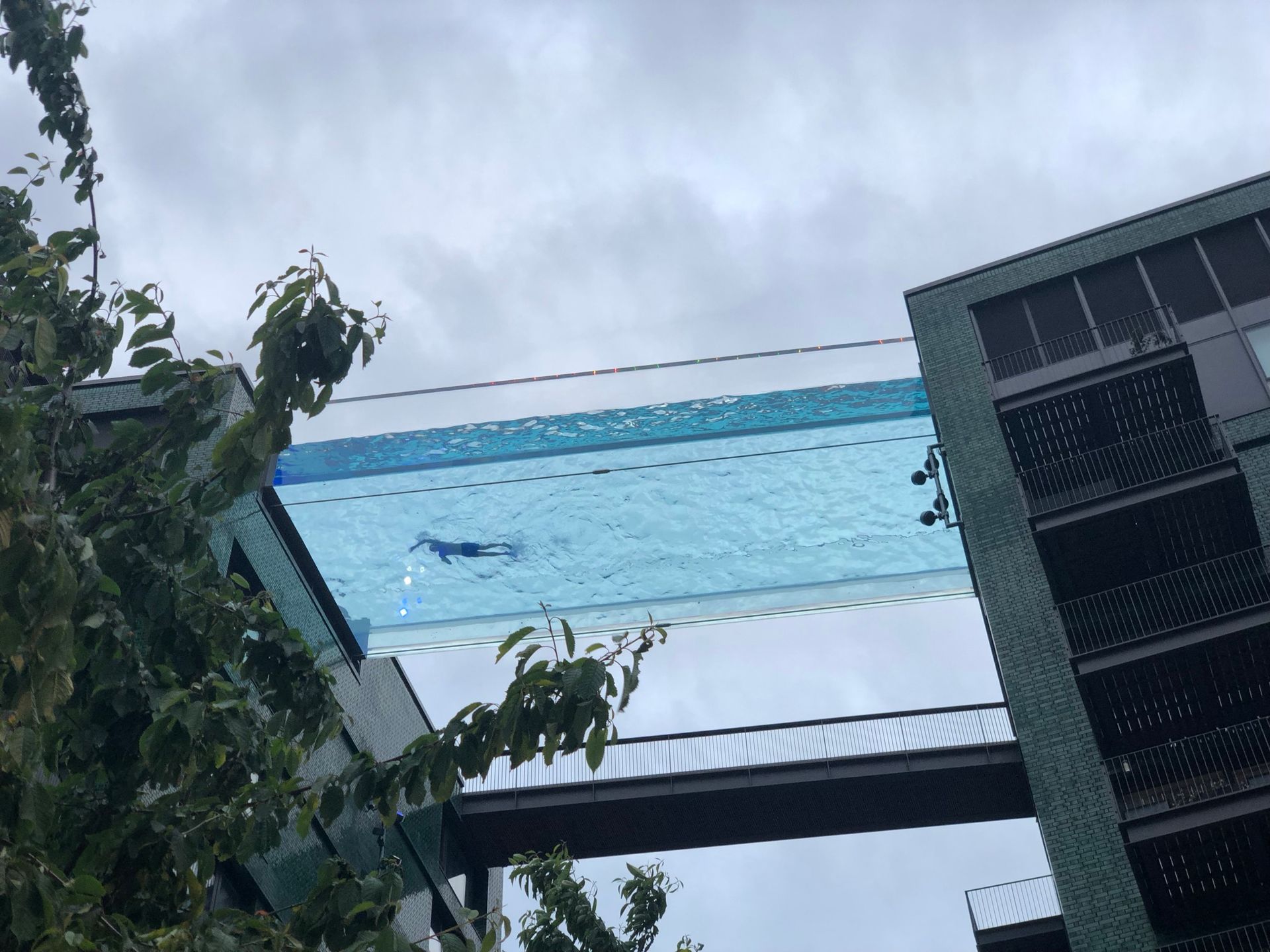 Swimming pool in the sky linking two buildings towerblocks